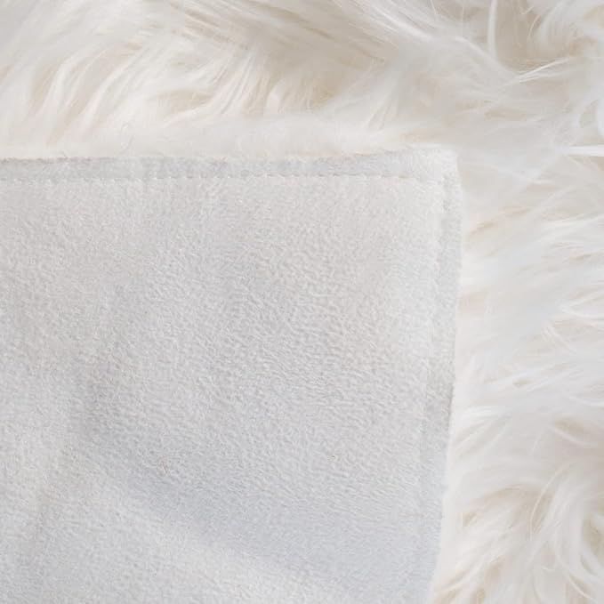 SAFAVIEH Faux Sheep Skin Collection 2' x 3' Ivory FSS115A Silken Glam 2.35-inch Thick Accent Rug