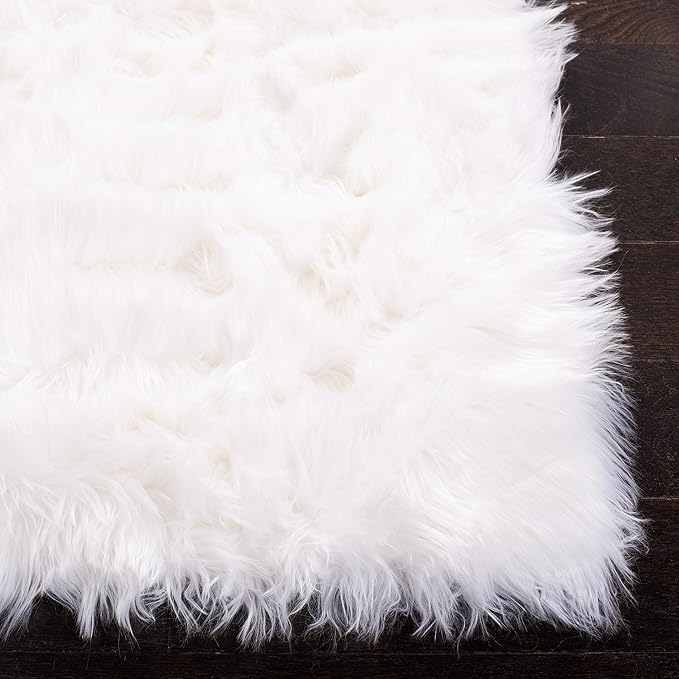 SAFAVIEH Faux Sheep Skin Collection Area Rug - 5' x 7', Ivory, Silken Glam Design, Non-Shedding & Easy Care, 2.35-inch Thick Ideal for High Traffic Areas in Living Room, Bedroom (FSS235A)