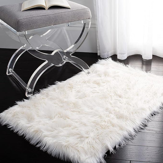 SAFAVIEH Faux Sheep Skin Collection Accent Rug - 2'6" x 4', Ivory, Silken Glam Design, Non-Shedding & Easy Care, 2.35-inch Thick Ideal for High Traffic Areas in Foyer, Living Room, Bedroom (FSS235A)